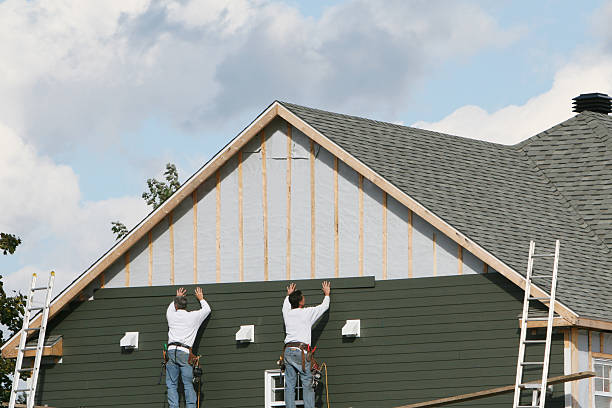 Professional Siding Contractor technician working in Manchester, VA